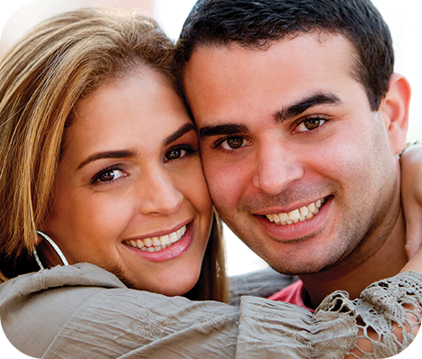 woman with her arms around partners neck