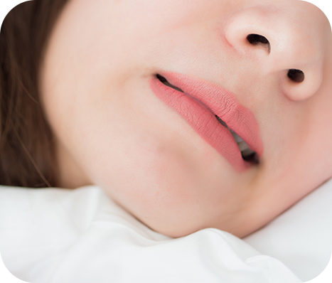 woman grinding her teeth in her sleep