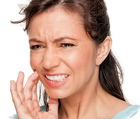 woman nursing her toothache