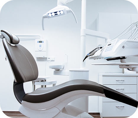 dental chair surrounded by dental equipment